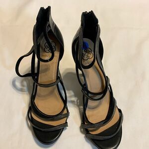 Daisy Fuentes strapping stiletto heels with zip up back closure
